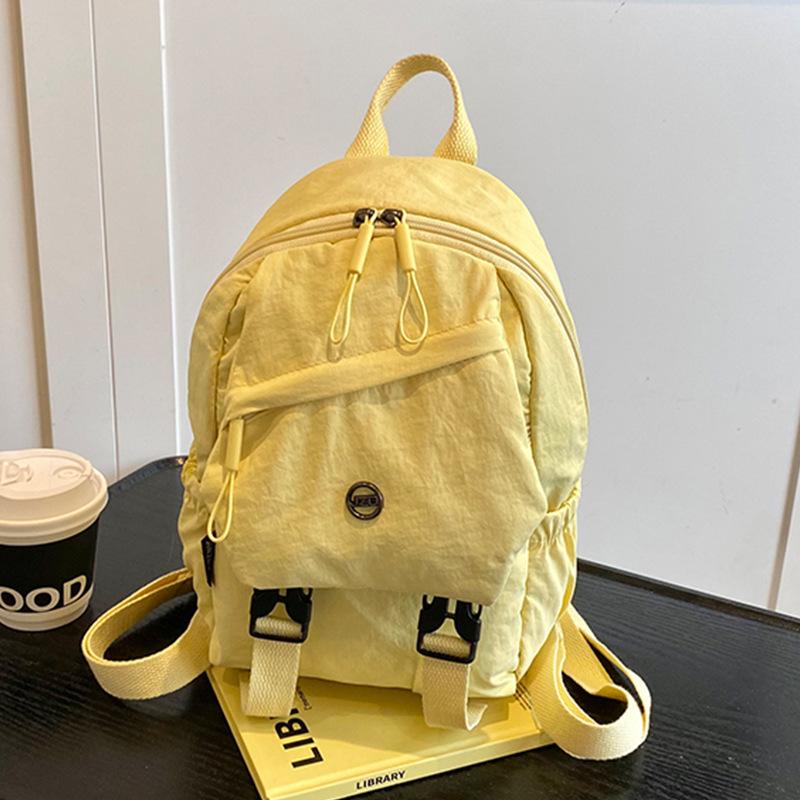 2025 новый модный атмосферный простой рюкзак однотонный школьный рюкзак большой вместимости сумка через плечо популярная маленькая квадратная сумка