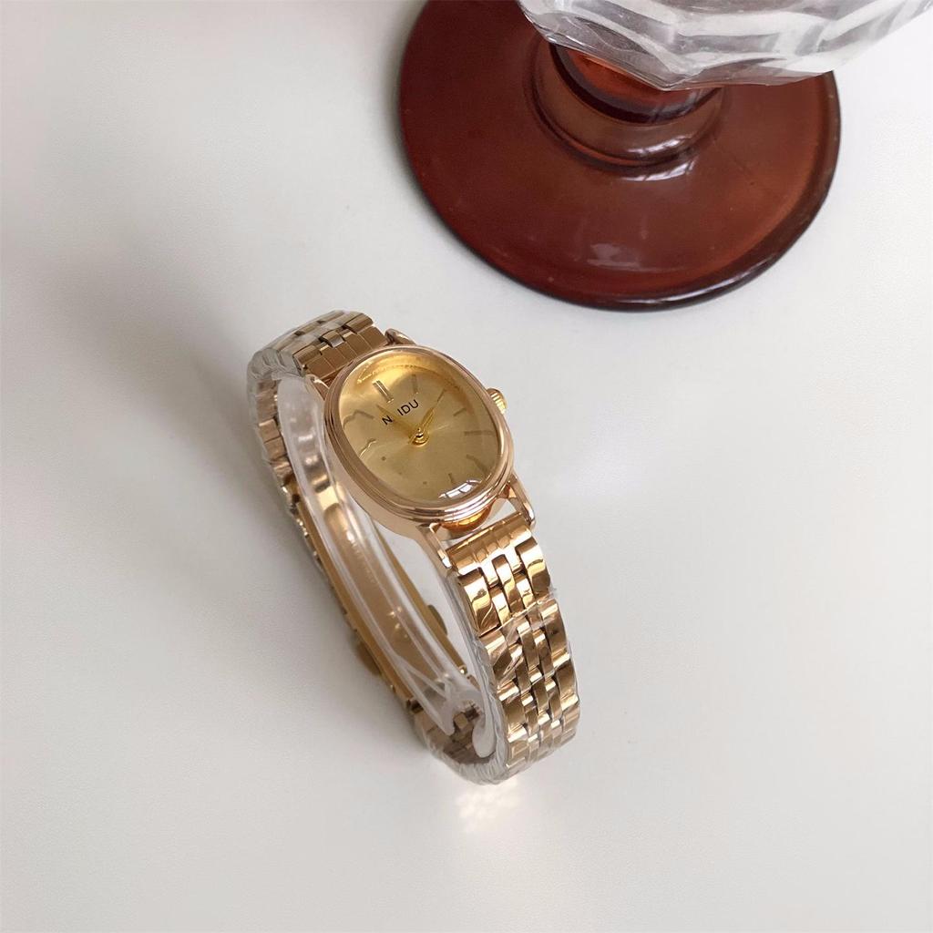 NAIDU Женские повседневные часы класса люкс с овальным циферблатом и стрелочными метками - Стиль знаменитостей, Лидер продаж.
