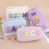 4 Pcs Cosmetic Bag Embroidered Letter Large Capacity Zipper Closure Oblong Shape Travel Bag for Cosmetics Snacks Phones Makeup Organizer