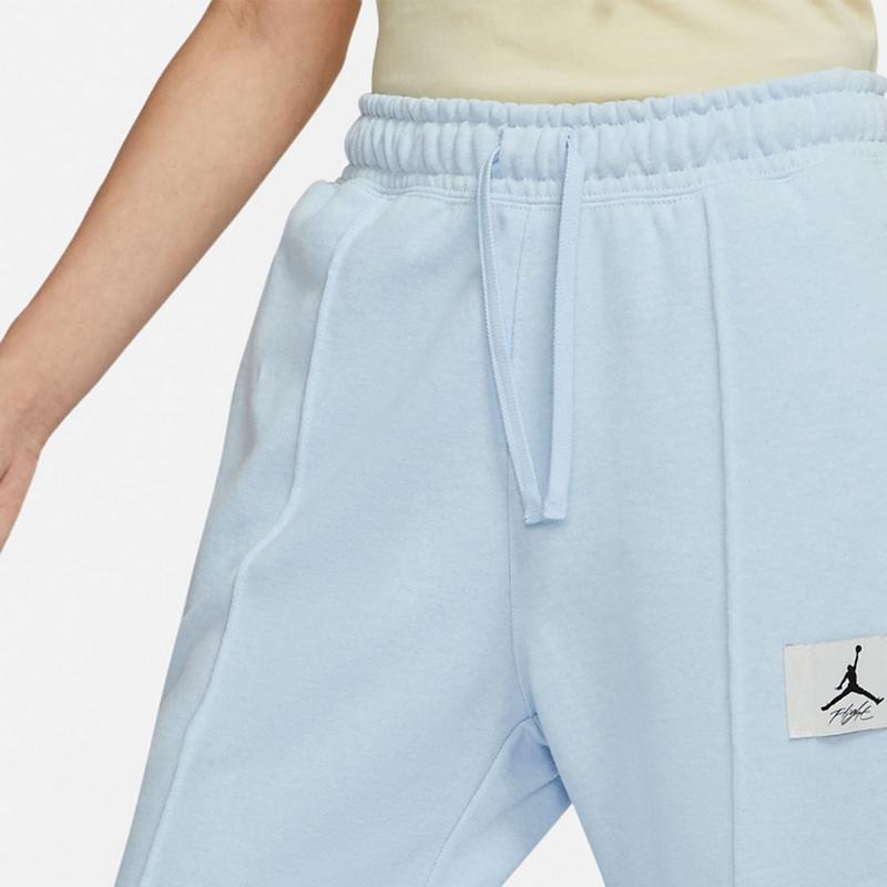 Nike Спортивная одежда Джоггеры с логотипом и эластичной резинкой на талии и манжетами Женские брюки серого цвета DD7002-438