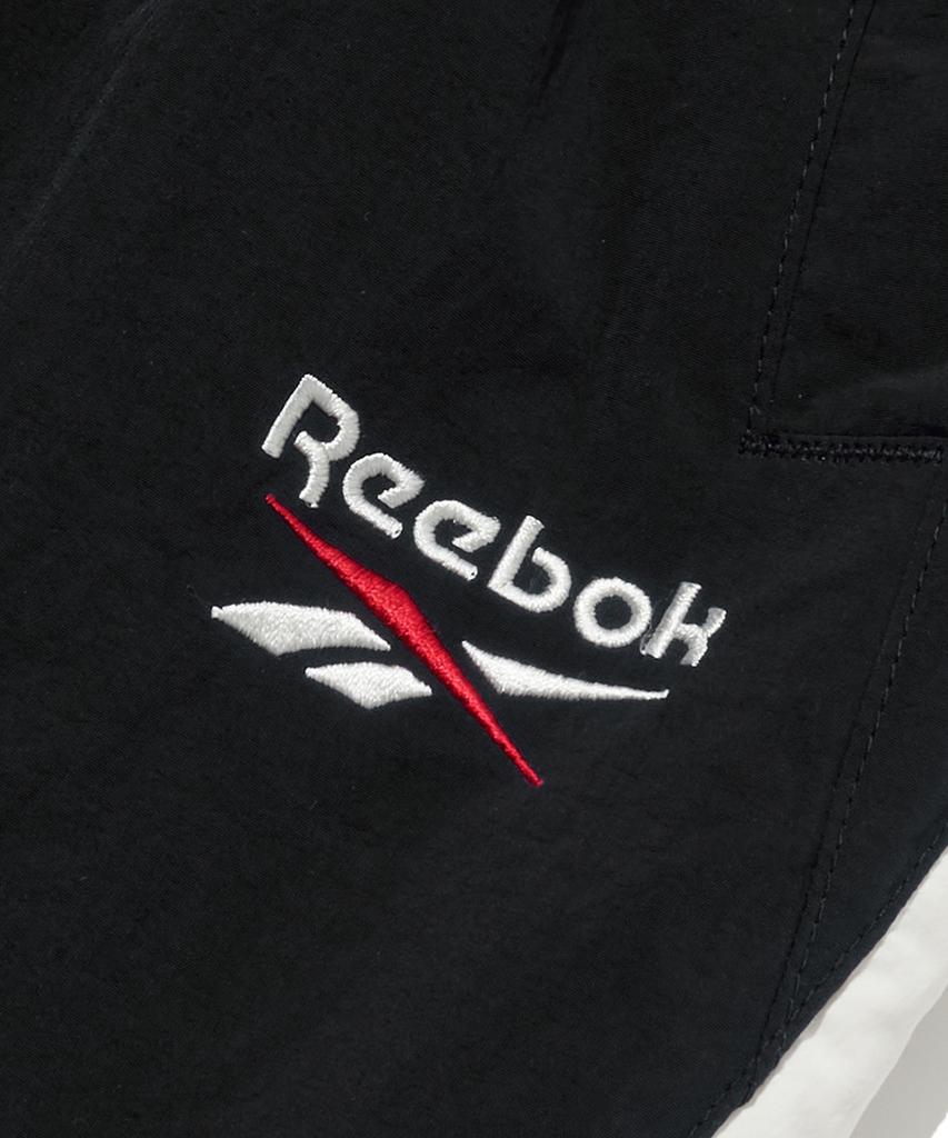 Reebok Теплые тренировочные брюки Heritage 2-Way - Черный