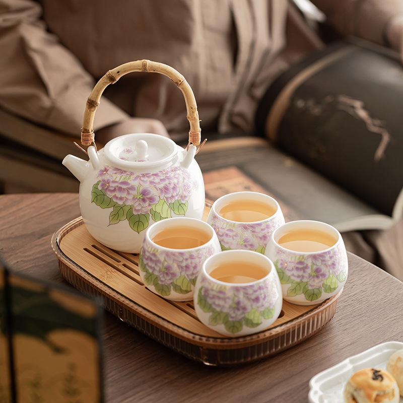 Suet jade porcelain large lifting beam pot, one pot, two cups, four cups, Kung Fu brewing teapot, tea set, household teacup.