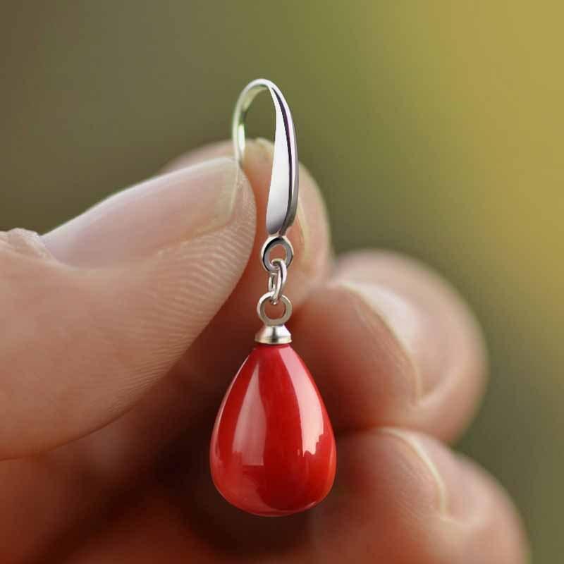 Висячие женские серьги с красным жемчугом