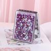 Girlish Heart Double-Sided Portable Makeup Mirror - Cute, Compact, and Foldable.