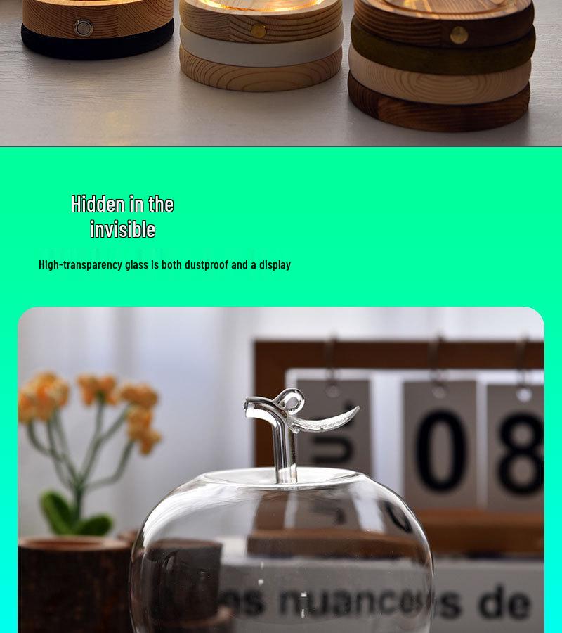 Купол из стекла с изображением вареных яблок и цветов, украшенный глиняной поделкой, для украшения рождественского стола.