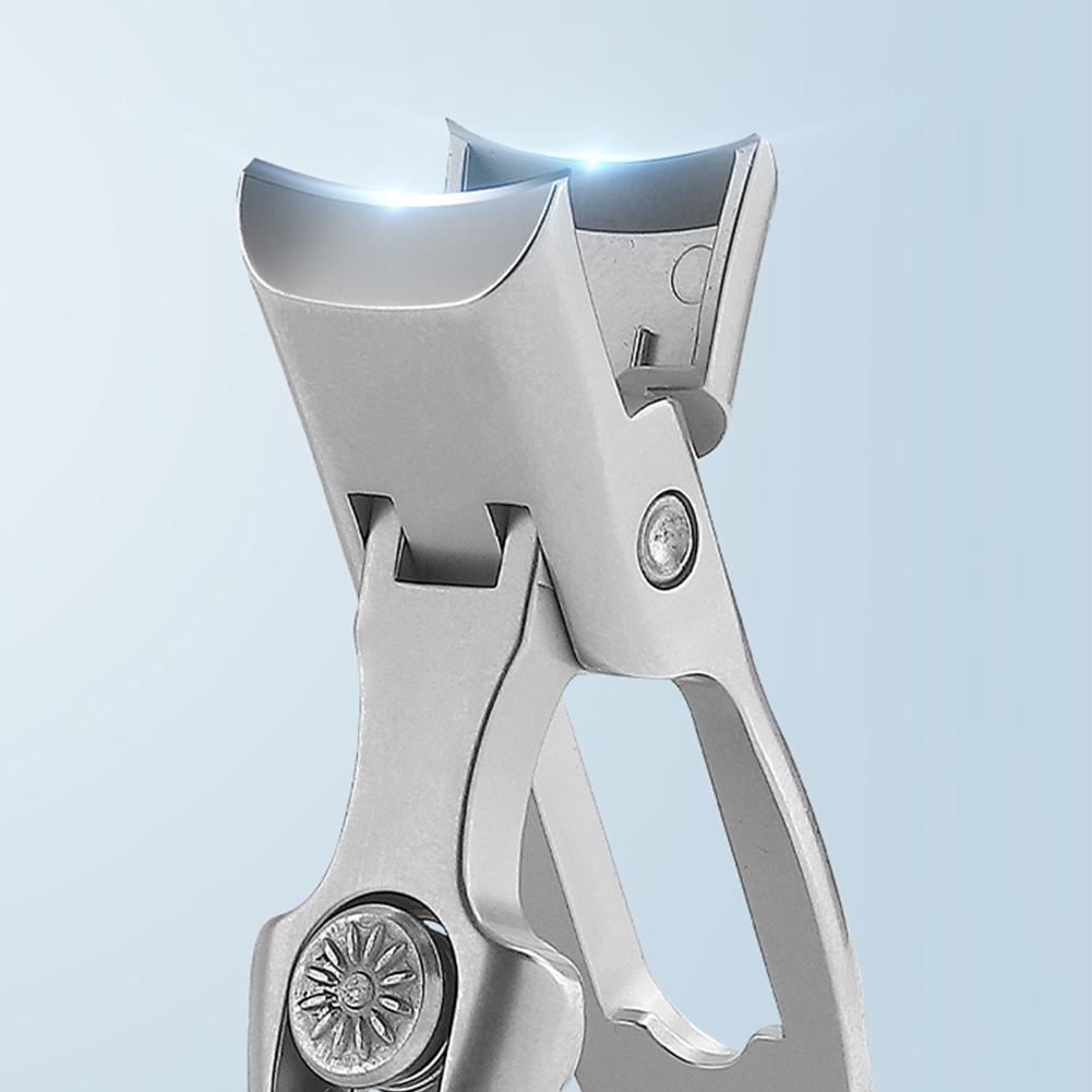 Self-locking folding nail clippers