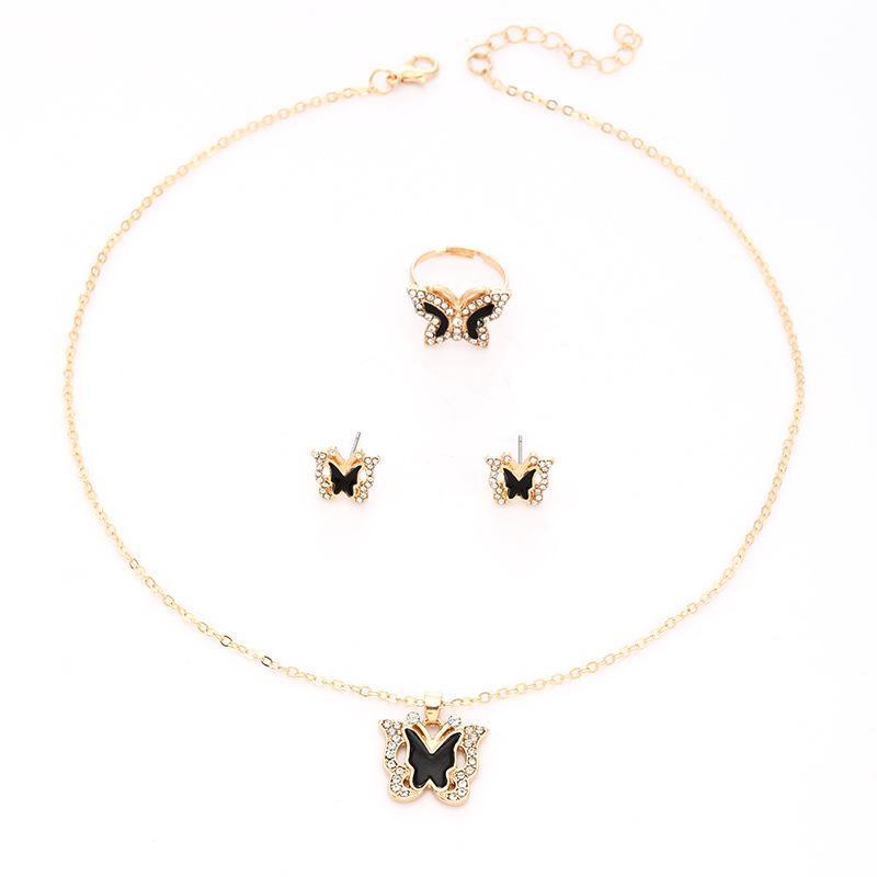 Shein Trendy Butterfly Jewelry Set: High-End Diamond Hollow Necklace, Ring & Earrings for Women - European & American Fashion.