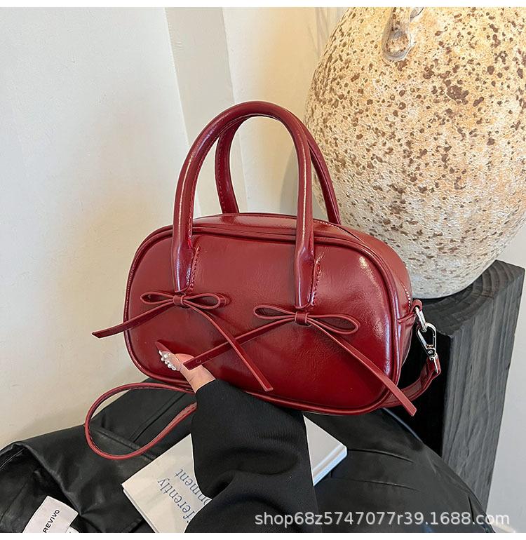 Red Bow Baguette Underarm Bag Women's 2025 New Fashion Commuter Premium Sense Bag Portable Shoulder Bag
