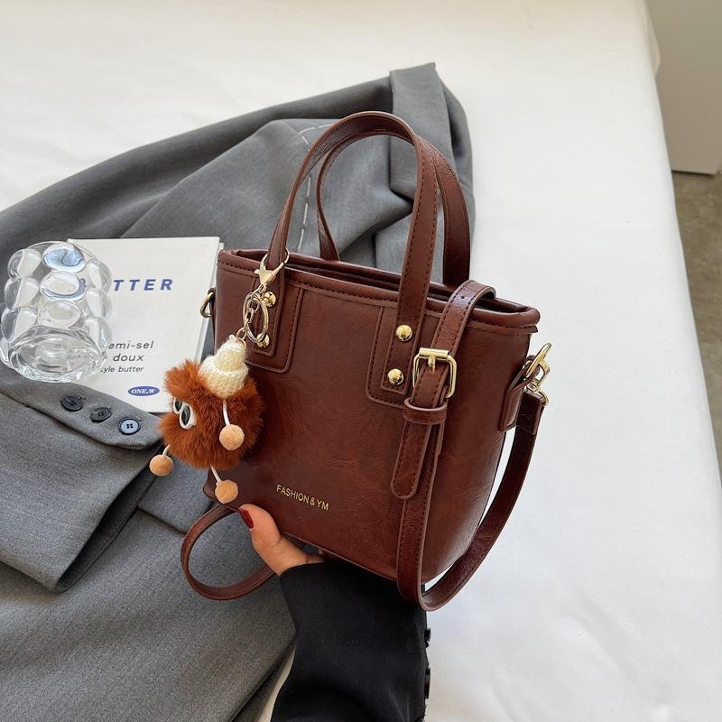 IELGY Fashionable Versatile Shoulder Messenger Bag, Textured Explosive Portable Bucket Bag