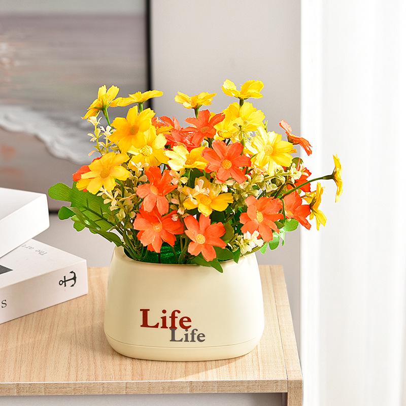 Living Room Decor: Artificial Sunflower and Green Plant Arrangements, Small Potted Plants, and Plastic Bouquets