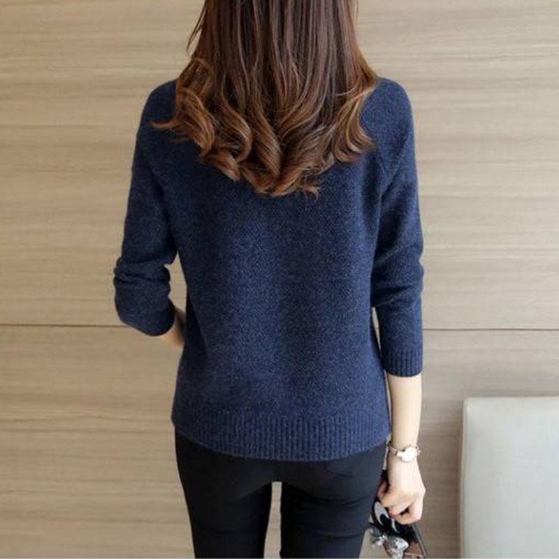 Стильный женский пуловер с разрезами по бокам