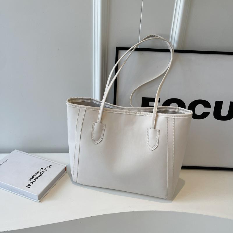 Сумка Commuter Texture temper 2024 лето новая красивая корейская версия сумка через плечо подмышкой модная сумка-тоут