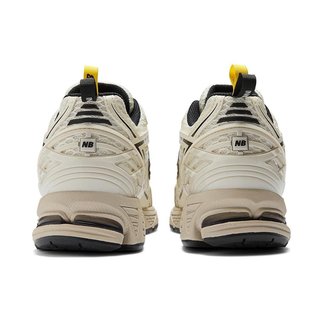 Кроссовки унисекс GANNI x New Balance 1906R Egret кремовый черный ярко-желтый M1906RGG