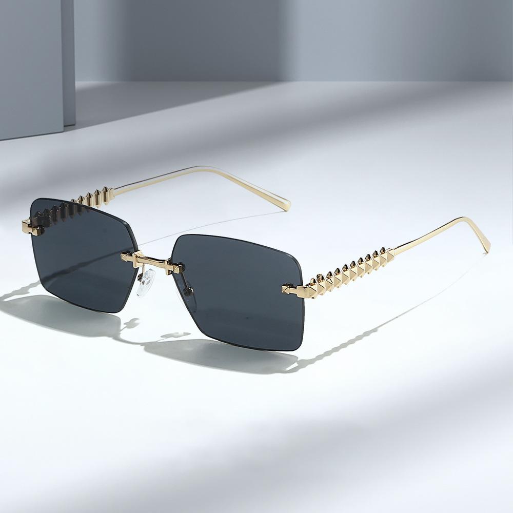 New frameless premium metal rivet leg sunglasses fashionable vacation driving sunscreen women's sunglasses