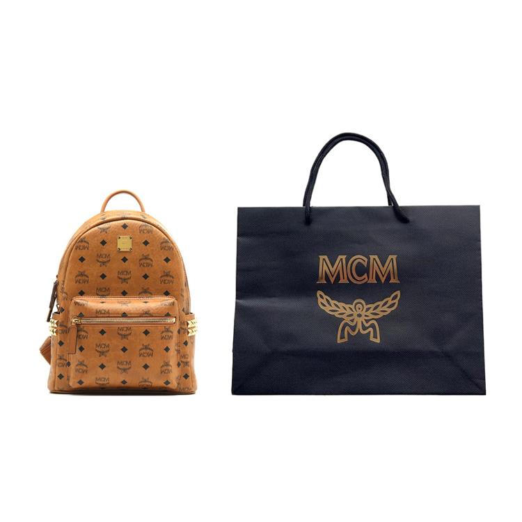 MCM Stark Classic Monogram Double-Sided Studded Commuter Party Canvas And Leather Backpack Unisex backpack Brown Cognac MMKAAVE15CO001