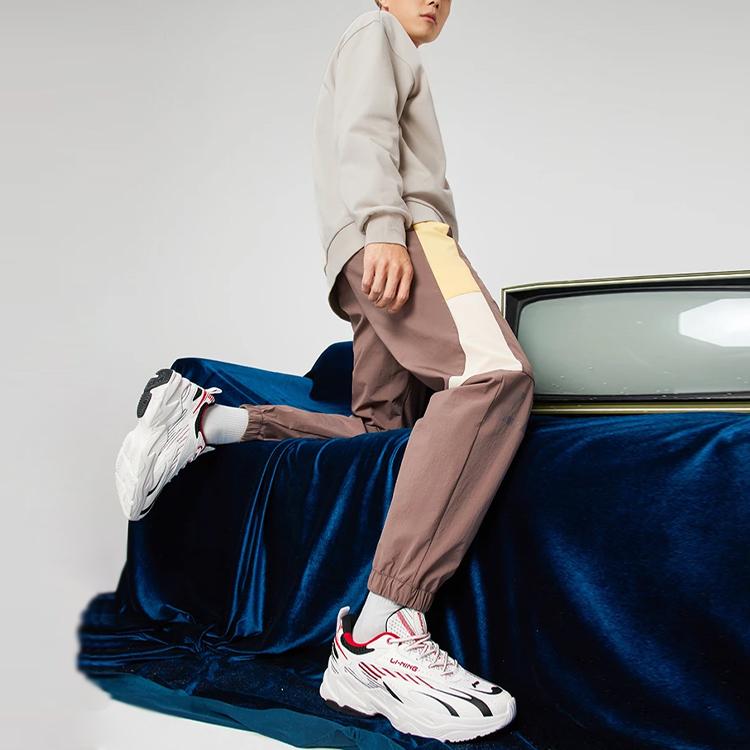 Штаны для бега с цветными блоками LiNing Sport Life, трикотажные, мужские, низ, перцово-коричневый AYKS309-5