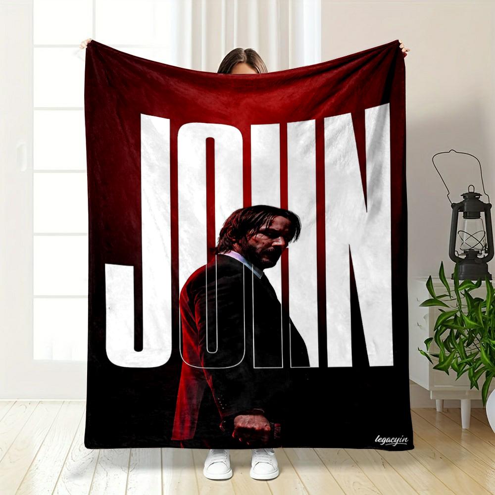 "Bold red design with man holding weapon Warm blanket" Flannel blanket for bedroom, living room, sofa, and nap.