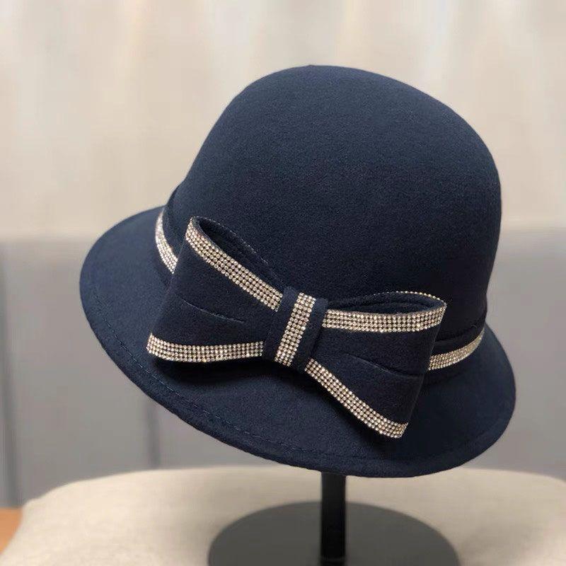 Осенне-зимняя женская шапка-бини ручной работы из чистой шерсти с большим бантом, элегантная и универсальная, маленькая шапка-тазик с подвернутым краем для женщин