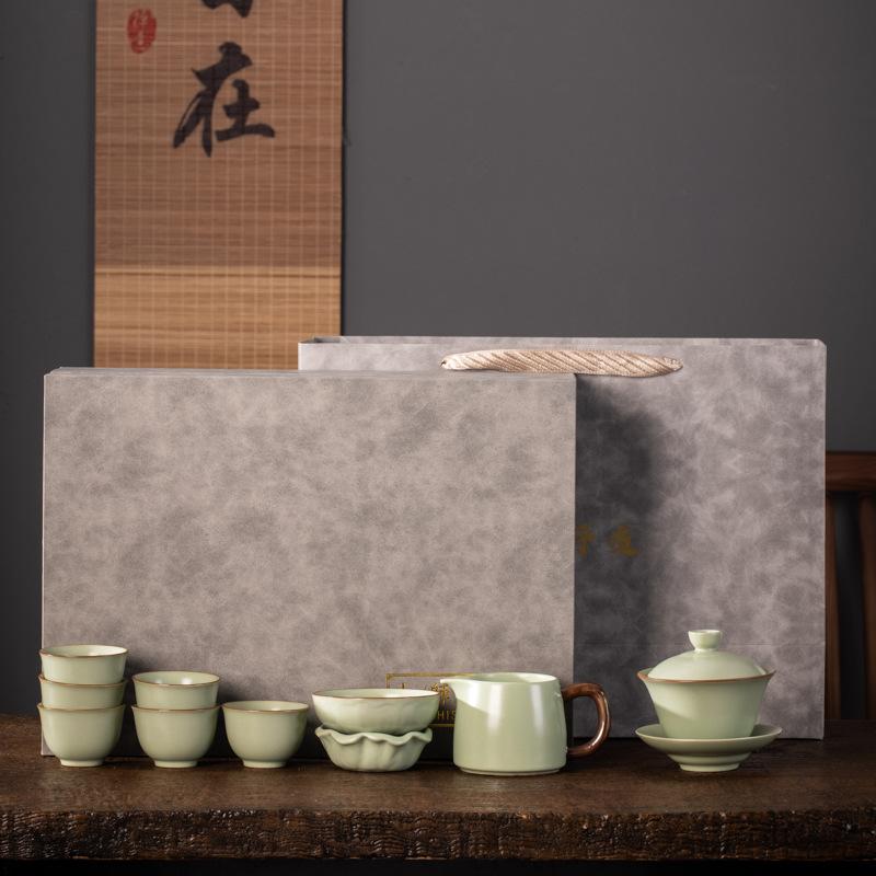 Ceramic Huang Ru Kiln tea set can be raised with an opening film and a gift box. Business souvenir gifts can be made.