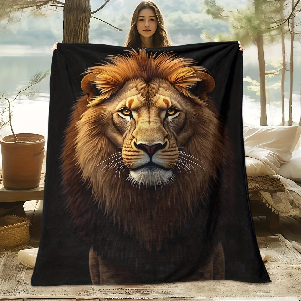 A Cozy Fleece Blanket Featuring a Lion Theme with Soft, High-Definition Digital Printing on a Black Background And Golden Mane, Perfect for Cooling Al