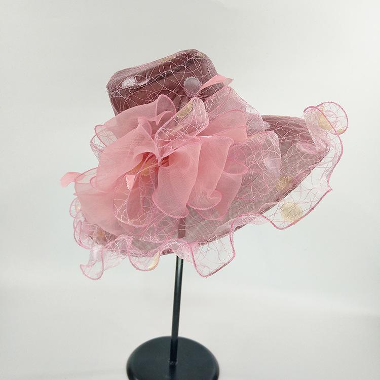 A new summer anti-ultraviolet European and American women's fashion hat, big flower fashion mesh hat, big edge hat.