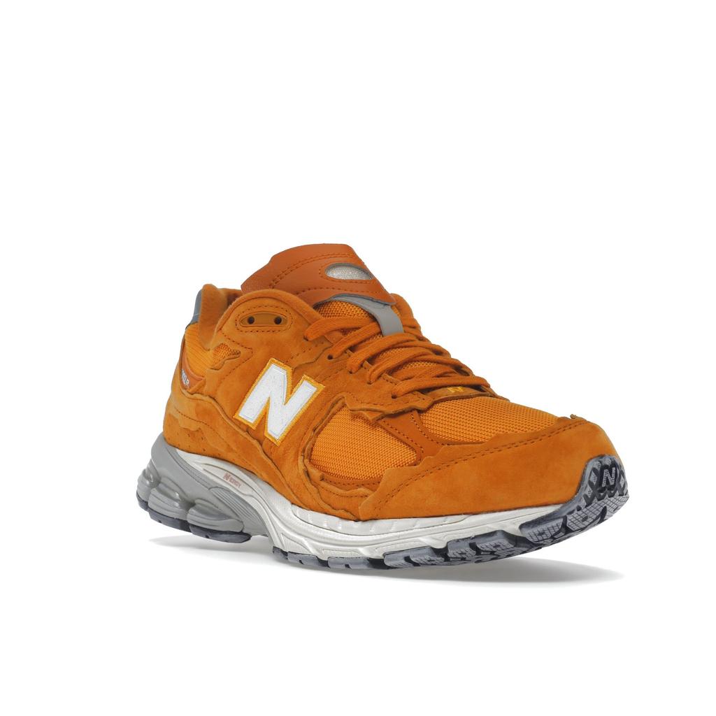 New Balance 2002R Protection Pack — винтажные оранжевые кроссовки унисекс Marigold M2002RDE