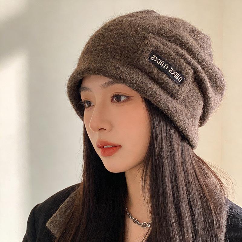 New autumn and winter hats, women's stacking hats, small face baotou hats, cold-proof and warm ear protectors, pullover hats, tide