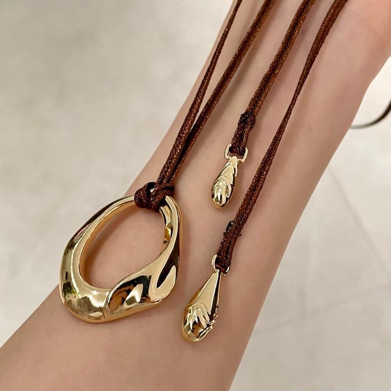 Женское черное ожерелье с подвеской из веревки - Металлический круг Дун Цзе, Длинная цепочка для свитера, Винтажный роскошный стиль