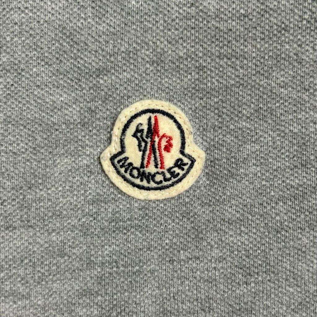 Б/у MONCLER 41091830985084093 Поло серое мужское