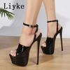 Liyke Летние босоножки на платформе с очень высоким каблуком 16 см, женские модные туфли с открытым носком и цепочкой на щиколотке, женские туфли для стриптиза, черные