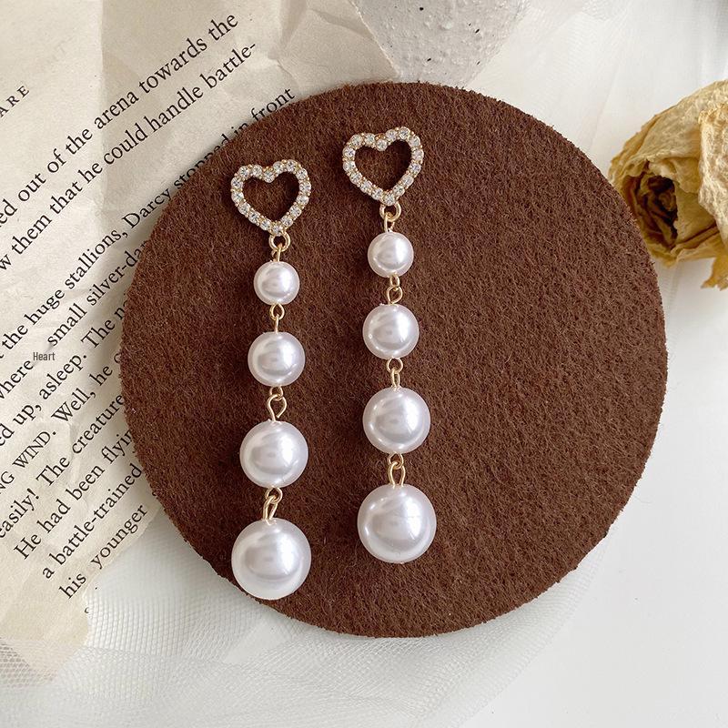 Korean S925 Sterling Silver Pearl Stud Earrings - Trendy and Elegant Design