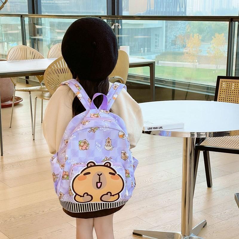 Capybara Cartoon Vibrant School Backpack For Children With Durable Nylon Material And Fun Design