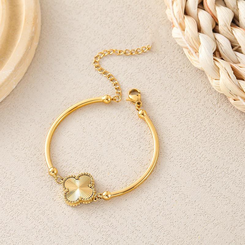 Элегантный золотой женский браслет и колье в виде четырехлистного клевера