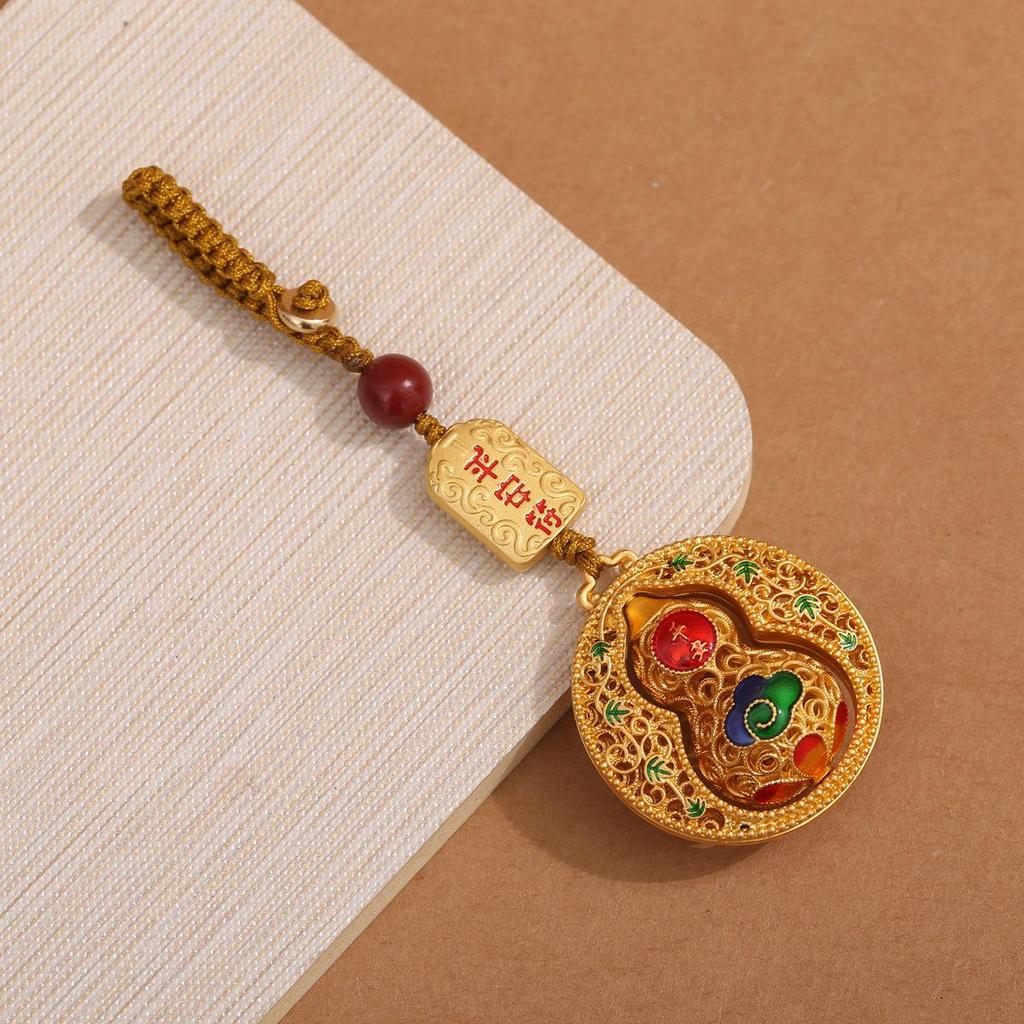 Брелок-тыква National Trend Sand Gold: Брелок для автомобильного ключа и мобильного телефона унисекс с филигранным дизайном.