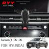 Hyundai Tucson-L (21-26) Держатель для телефона на приборную панель и крепление для навигатора