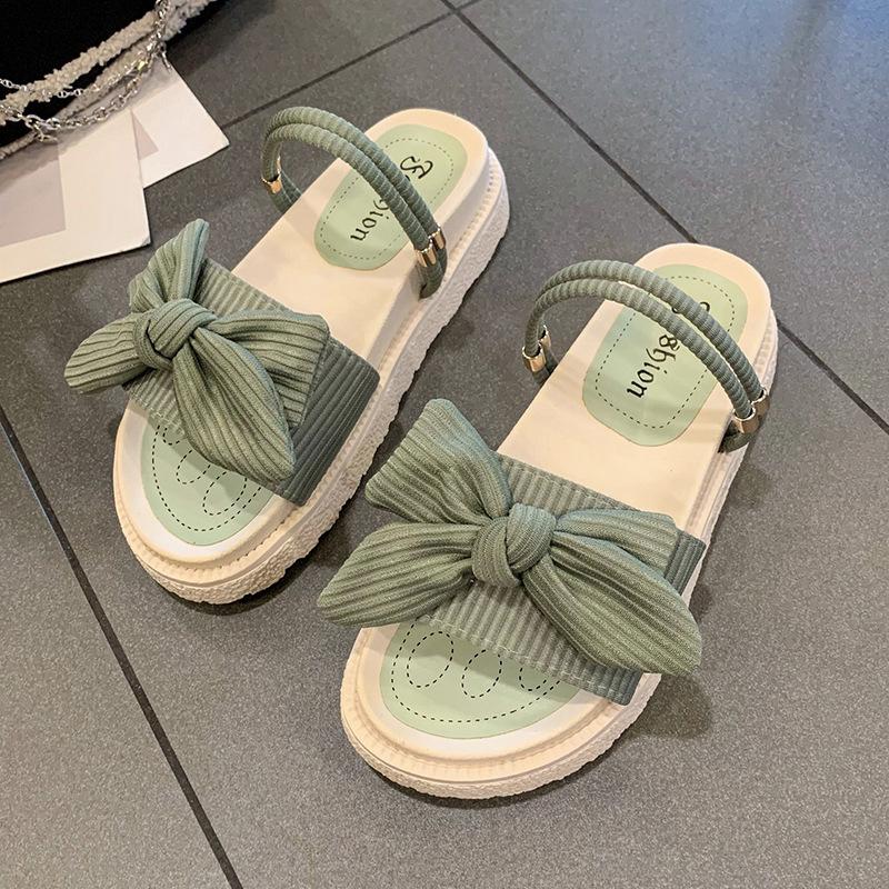 Two wearing sandals female summer flat-bottomed fairy fashion new student fashion thick-soled beach cool slippers