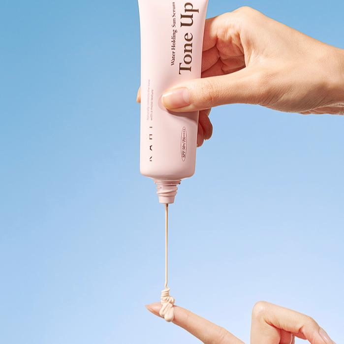 KAHI Солнцезащитная сыворотка Water Hold Tone Up SPF 50+ PA++++ 50 мл