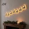 Christmas Wall Decorations for Home 7Pcs Glowing Wooden Silhouette Lights, LED Xmas Decor, Reindeer Decals Santa Tree Gingerbread Snowflake Ornaments