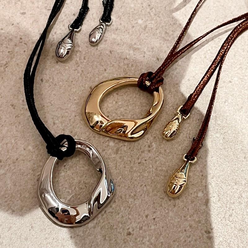 Женское черное ожерелье с подвеской из веревки - Металлический круг Дун Цзе, Длинная цепочка для свитера, Винтажный роскошный стиль