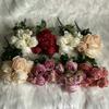 Vintage Style Wedding Venue Floral Arrangement With Artificial Greenery And Roses