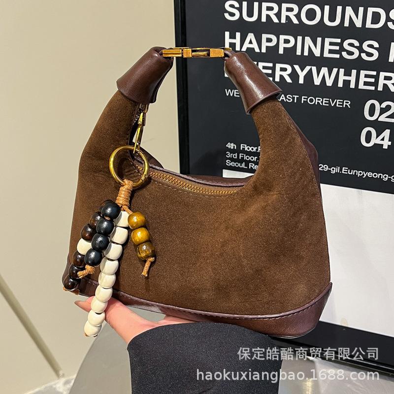 Сумка премиум-класса нишевая женская осень-зима 2025 новая матовая ретро сумка-мессенджер повседневная взрывная портативная сумка-пельмень