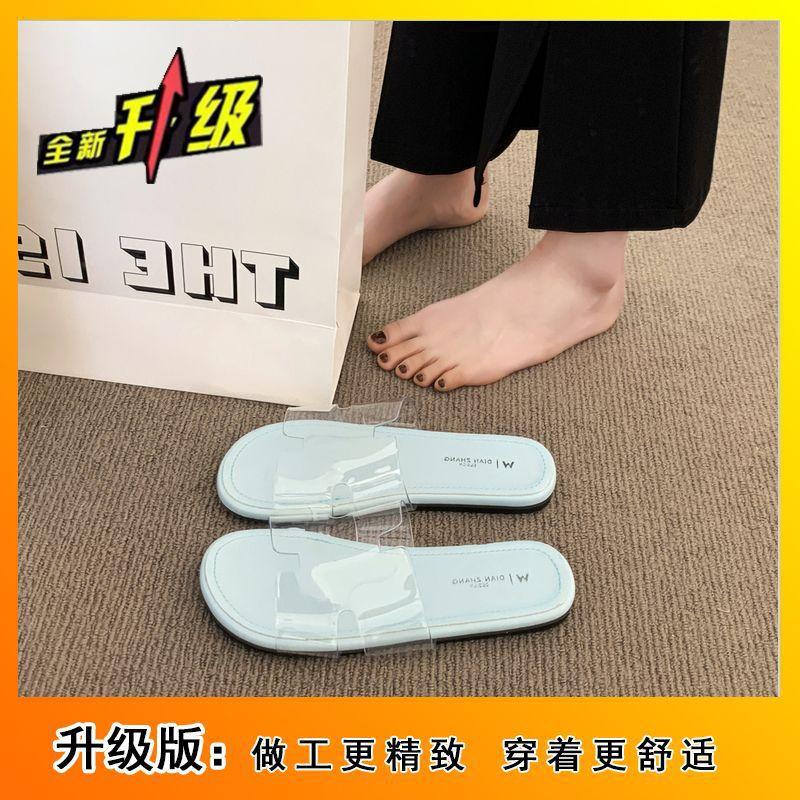 2025 summer new fashion versatile beach vacation flat bottom drag French temperament flat bottom cool slippers transparent word belt