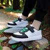 Кроссовки для детей, людей среднего и младшего школьного возраста, дышащие белые туфли, новые кожаные спортивные туфли для мальчиков из весенне-осенней коллекции.