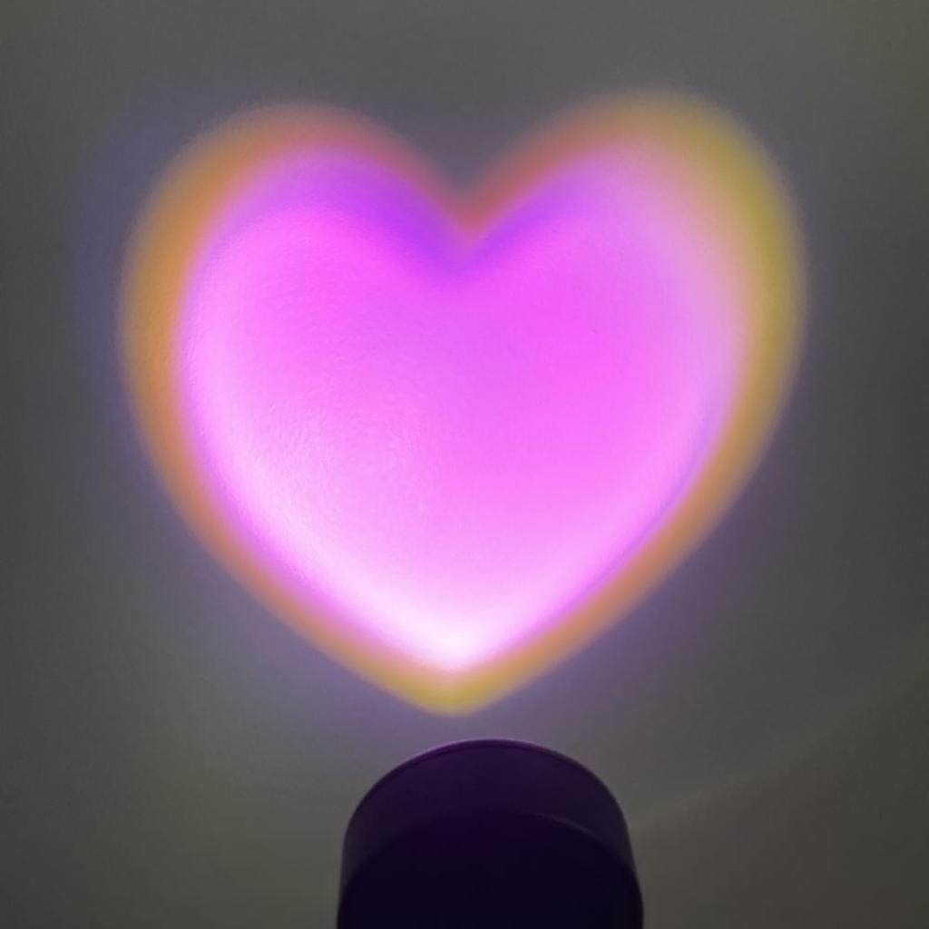 Pink heart-shaped table lamp projector sunset light environment night photography party bedroom Christmas room home decoration