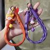 Mobile phone lanyard wrist braided rope short ins cartoon cute bell pendant pendant mobile phone rope outdoor travel