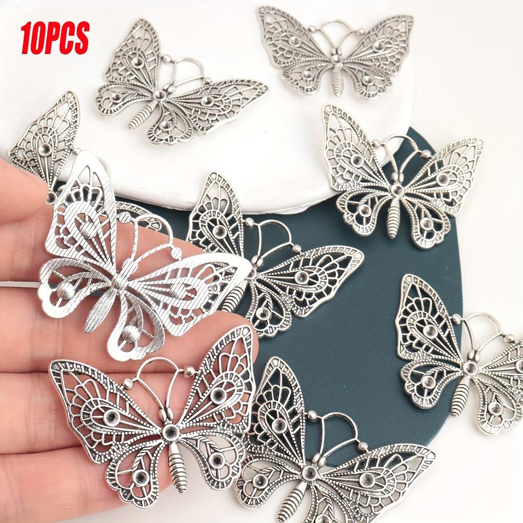 Lurkwolfer 10 piece antique butterfly pendant with hollowed out zinc alloy DIY jewelry craft accessories, can be used as keychai