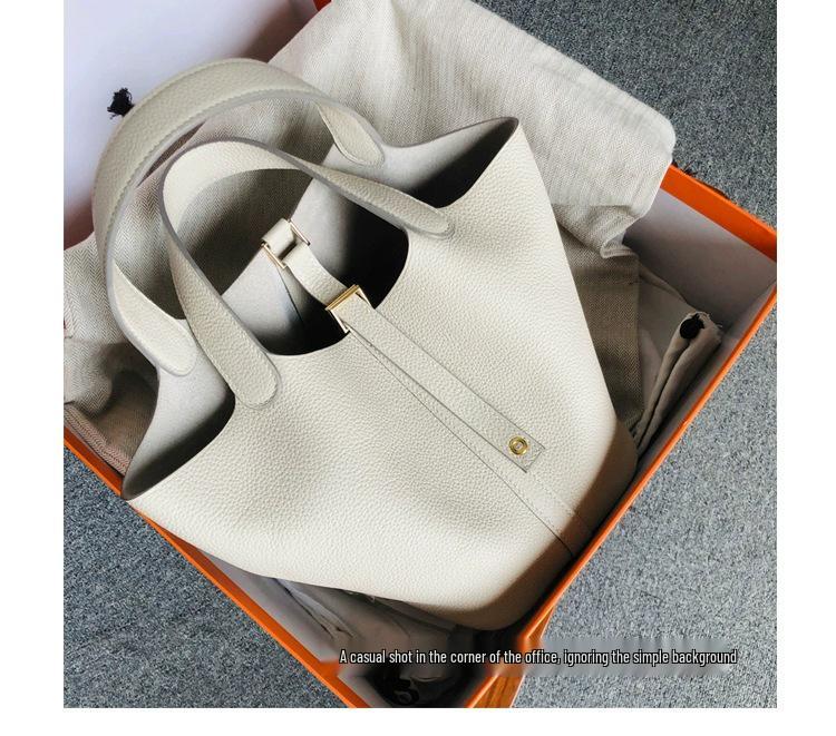 2025 Minimalist Veggie Basket Bag: Lychee Grain Cowhide, Fashionable & Spacious Handbag