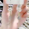 Cat's Eye Tassel Ear Chain 2024 Trend: Elegant Long Earrings with Light Luxury Design