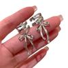 Изысканные серебряные серьги-банты с лентой для женщин, модные и элегантные металлические полые серьги-манжеты