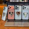 Чехол-подставка с бантом в форме сердца и бриллиантами для Apple iPhone 16 Pro/17 Pro Max